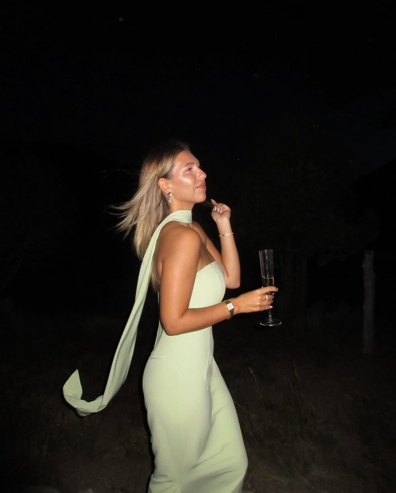 Emma in a pale green dress on a summer evening